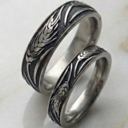 Пара титанових обручок із зображенням колосків пшениці